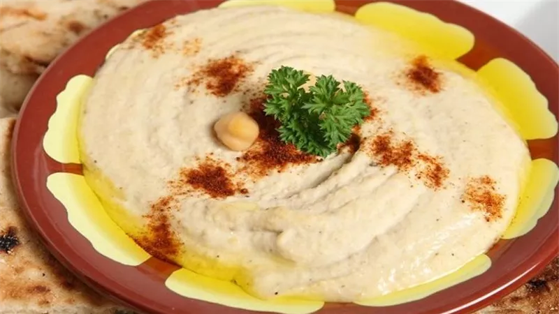 طريقة عمل سلطة الحمص بالطحينة والزبادي.. مقبلات رمضانية مفيدة جدا 